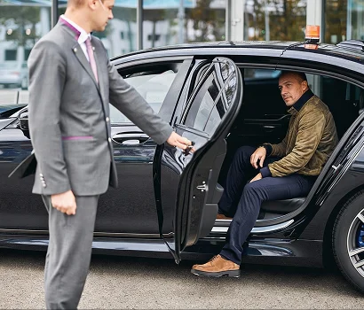 Chauffeur opening door